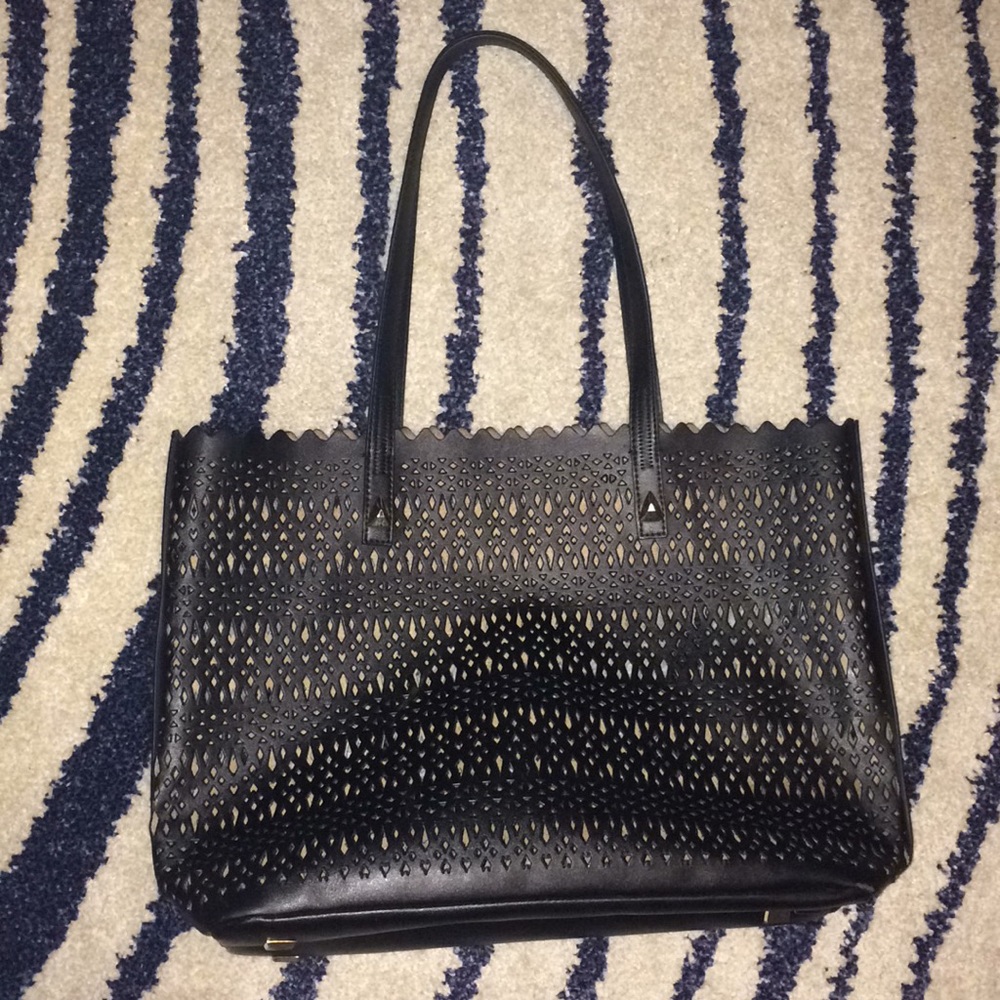 Perforated purse w gold accents